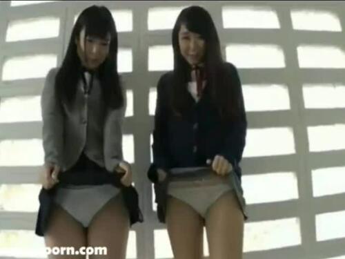 Sexy brunette Japanese schoolgirl masturbates in tight little skirt and stockings